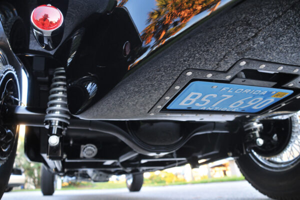 A retractable license plate folds into a pocket under the car when the ignition is off.