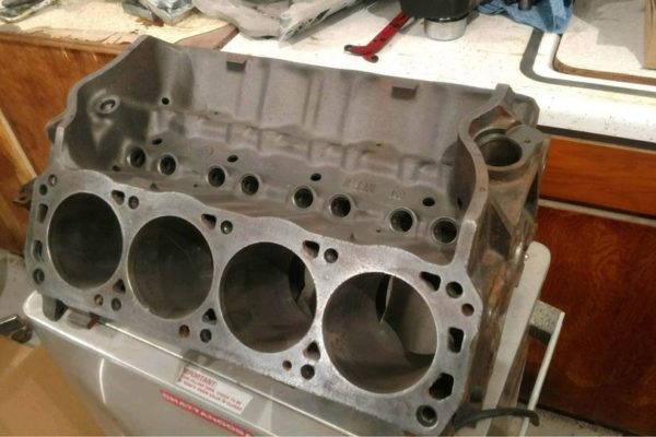 Fitting Cleveland cylinder heads requires three holes to be drilled in the top edge of the deck surface. A Boss-style head gasket is used to locate the holes.