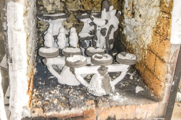  A mold is made for producing three pulleys at a time, which is then fired in a kiln.