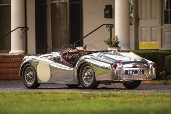 This wonderfully restored and upgraded TR2 rolls on MWS 60-spoke wire wheels shod with Dunlop RS65 racing tires.