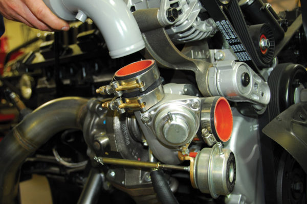 Attach the boost tube to both the turbo housing and the throttle body. Note the high-quality hose clamps.