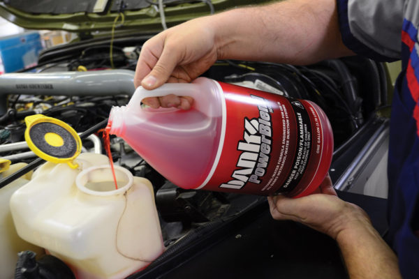 The windshield washer reservoir can be retapped for storing Banks’ water/methanol solution, but we’d be inclined to have a separate tank so we can keep our view clear on a dusty trail.