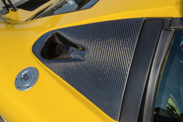 For a custom look, Vraptor SpeedWorks added carbon fiber trim on the rear quarters and hood louvers.
