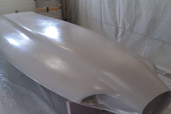 After finish sanding and 10 coats of wax, the bottom is now ready to begin mold fabrication.