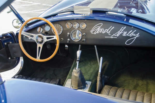 Without any prompting, Shelby climbed into the cockpit and signed the dash. He once admitted that he always wanted to put a cammer in one of his original Cobras.