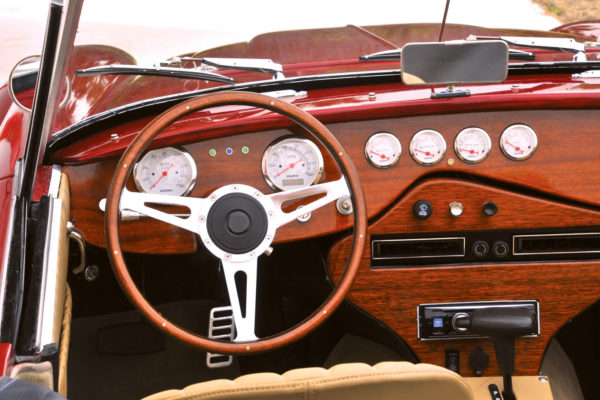 In response to a customer’s request, a generous amount of mahogany paneling and Dolphin white-face gauges were used. 
