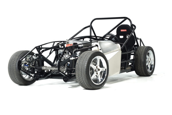 Note how the rolling chassis of the Factory Five Spec Racer has been beefed up. The passenger area is now fully surrounded by side structures, which tie the chassis into a solid box and give the passenger space full protection from side impact. The additional roll bar structure also provides additional chassis rigidity.