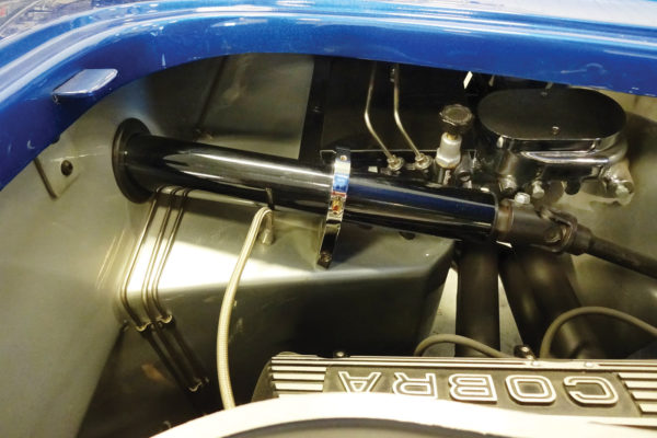 To match a Cobra build’s character, this column promises precision and adaptability. Constructed for Shell Valley, the steering column is surrounded by a rubber seal where it protrudes through the firewall. It is anchored by an inverted drop link attached to the upper surface of the footbox 
and terminates in a 1-inch DD inner shaft end 
connected to a universal joint.