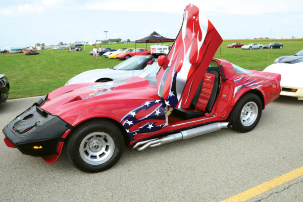 A flag-waver’s Corvette with the Coke-bottle curves and gull wings made everybody stand at attention.