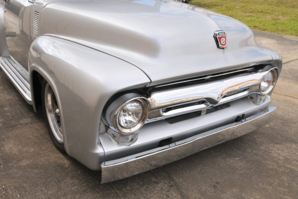 Mid Fifty F-100 Parts in Golden Valley, Arizona, supplied the fenders, running boards, and hood. 
This 40-year-old company specializes in 1948 
through 1956 F-Series Ford parts. 