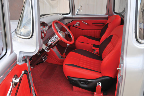 Jeff’s Auto Interior in Malabar, Florida, fitted the cabin with synthetic red leather with black carbon fiber-style inserts, similar to interiors found in the new Corvettes. The twin Jeep Grand Cherokee buckets, door panels, and console share the two-tone color scheme. 