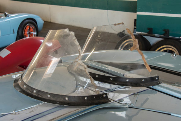 Remember the scene where an angry Ken Miles throws a wrench at Carroll Shelby and breaks a wind deflector on a Cobra? That probably didn’t happen in real life, but
a couple of windshields were damaged on purpose during filming by using a Dremel tool, rather than a wrench.
