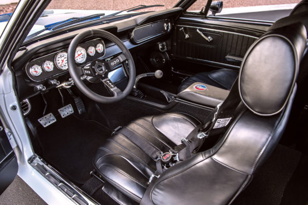 The inviting cockpit is spiffed out with Carroll Shelby Scat Rally Series 1000 high-back seats and a Sparco aluminum steering wheel.