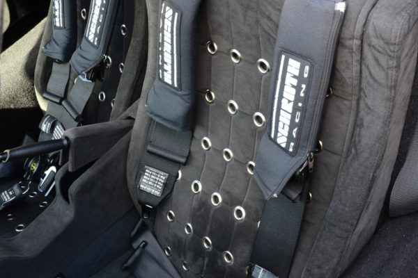 Schroth five-point racing harnesses are a must for a race car on the street.