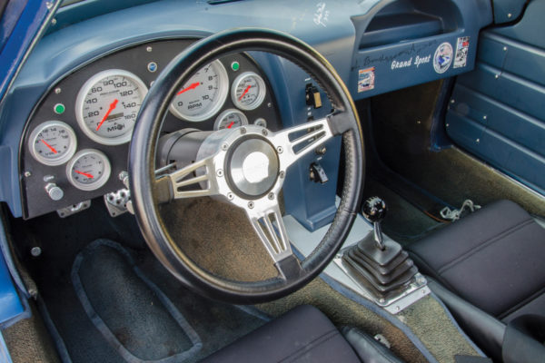 White-face Pro Comp gauges provide a more legible readout than seen on the original Grand Sport.