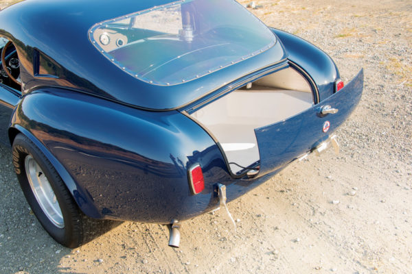  To clear the trailing edge of the hardtop, Kirkham Motorsports fabricated a custom, two-part lid to provide access to the trunk.