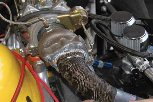 Start the exhaust wrap by securing it with the Design Engineering Inc. stainless locking ties. Then continue to wrap the pipes with about a quarter-inch overlap. Keeping the wrap tight is the goal as you go along. DEI suggests starting the header wrap at the exhaust port and taking your time. The tighter the wrap, the better the hold and less chance of a loose or irregular fit. After you have all the wrapping done, run the engine up to operating temperature to create a baking effect. Some smoking of the pipes is normal and will subside after several days. It’s advised not to try to clean the wrap with high-pressure water or air. Instead, use a wet shop cloth to remove dirt and debris.