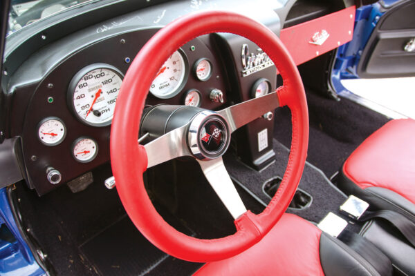 In keeping with this replica’s more modern 
engine, the cockpit has a newer type of gauge and thicker steering wheel.
