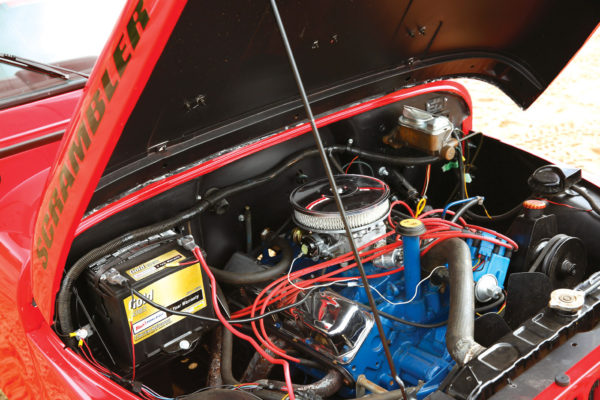 The ’78 AMC 304 ci V8 engine was already installed when John purchased the vehicle, but he added Hedman headers and an HEI distributor. Since fiberglass doesn’t conduct electricity, he also added a common ground wire that runs to the negative pole of the battery.