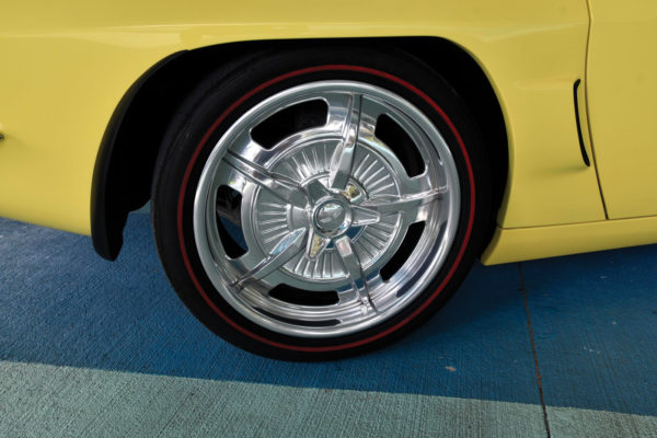 EVOD Industries developed its own version of the classic hubcap wheel of the late ’50s and early ’60s. They’re wrapped in Nitto tires with a red line treatment to emulate styling of the period.
