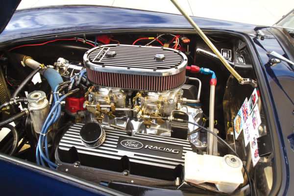 Dual carbs, an Edelbrock intake and a stroked crankshaft deliver 475 horses, plenty of propulsion in a Cobra lightened up with carbon-fiber.