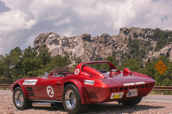 While the granite sculptures of Mount Rushmore are impressive, so are the hard lines of this Grand Sport roadster.