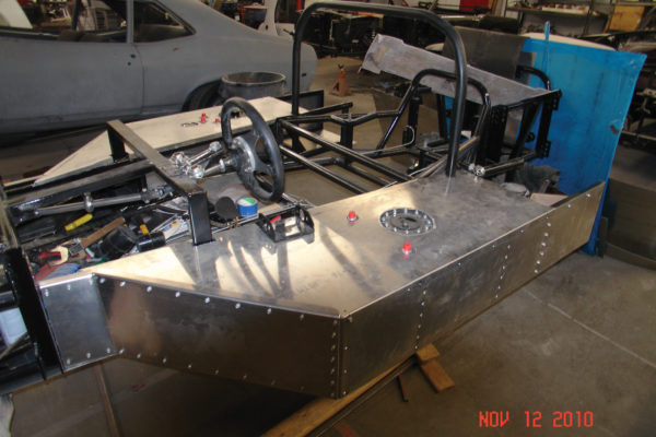 Once the tubular frame was done, aluminum skins 
were riveted on.