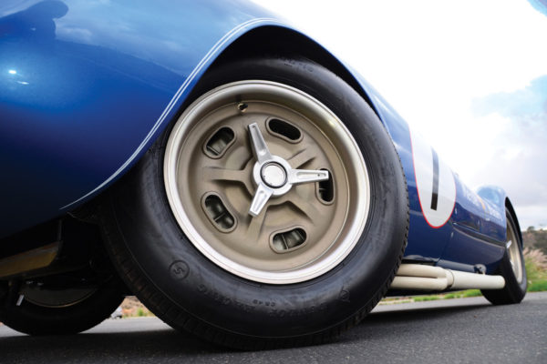 Magnesium Sebring-style, kidney-bean wheels are in front, and “Champ”-style wheels are in the rear, both treated with Dow 7 coating to provide vintage gold finish, and wrapped with Dunlop vintage race tires. 