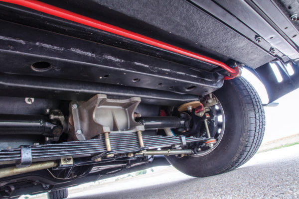 A custom, heim-jointed stabilizer bar braces the 
chassis for more sure-footed cornering.