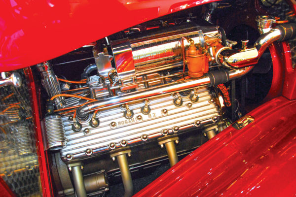 The engine, a flathead Lincoln V12, is as nicely finished as the steel bodywork. A pair of Winfield 
Double D carburetors were adapted as mirror-image side-draft carbs on opposite sides of the vintage Latham axial flow supercharger.