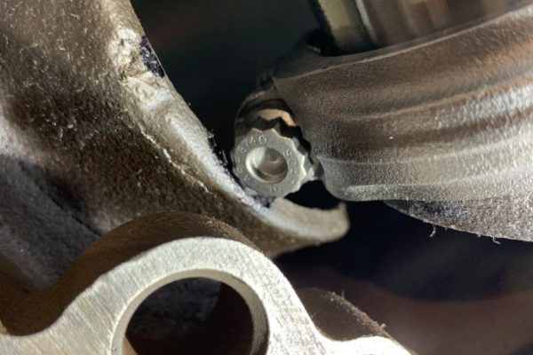 Here you can see how the longer stroke on our new crank causes the rod bolts to hit the bottom of the cylinder bores.