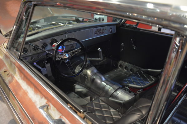 I like the mix of classic and modern cues inside this Polara. The dash and gauges are retro drag racer, but the modernized pistol-grip shifter fits perfectly.