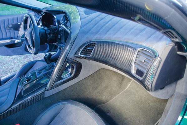  The cockpit is highly customized as well, with carbon fiber cover pieces for the dash, console and door panels, plus suede-style Alcantara and leather upholstery.