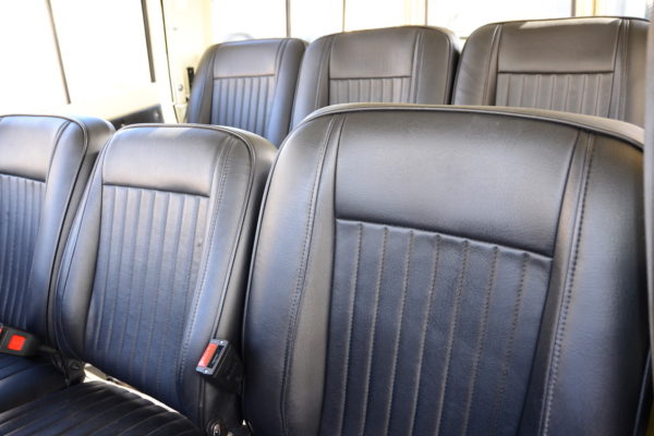 The Series II seats as many as 10 passengers, with facing bench seats in the rear.