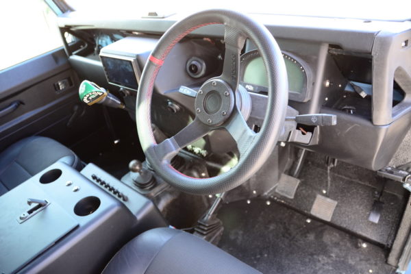 The Defender’s interior was spruced up with hand-fabricated aluminum panels and modern electronic monitors.